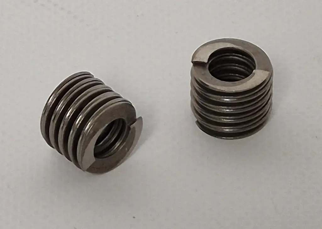 Helical disc spring